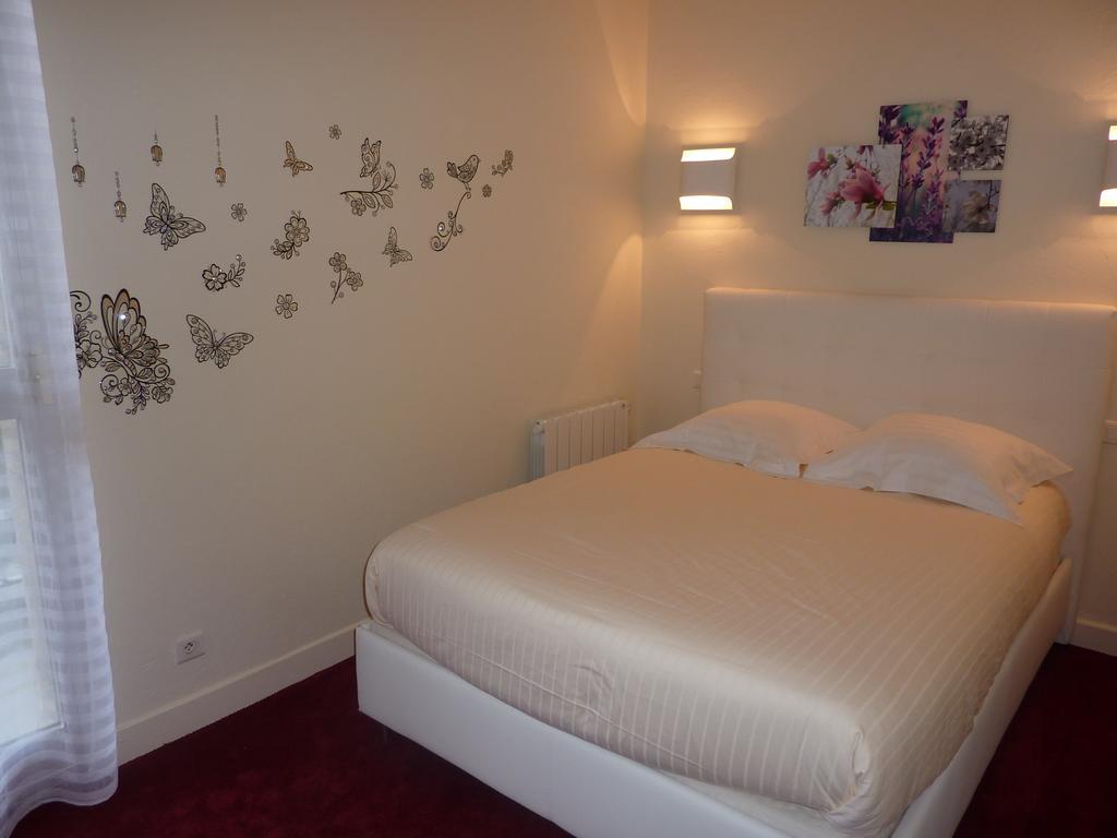 Hotel Le Square Aurillac Bagian luar foto