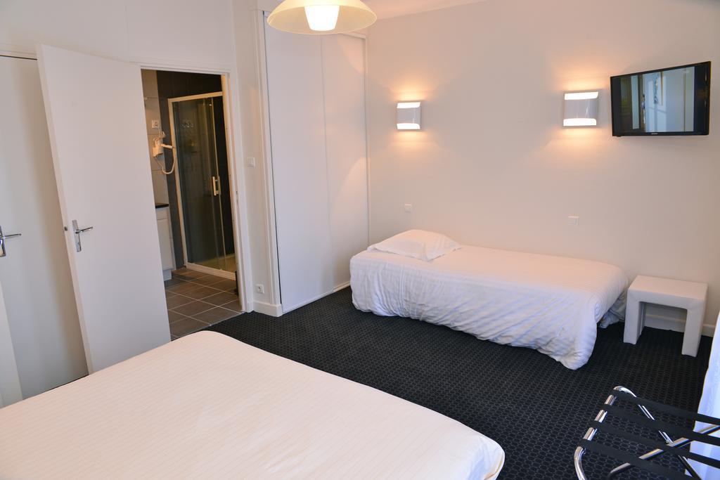 Hotel Le Square Aurillac Bagian luar foto