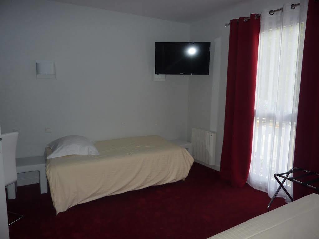 Hotel Le Square Aurillac Bagian luar foto
