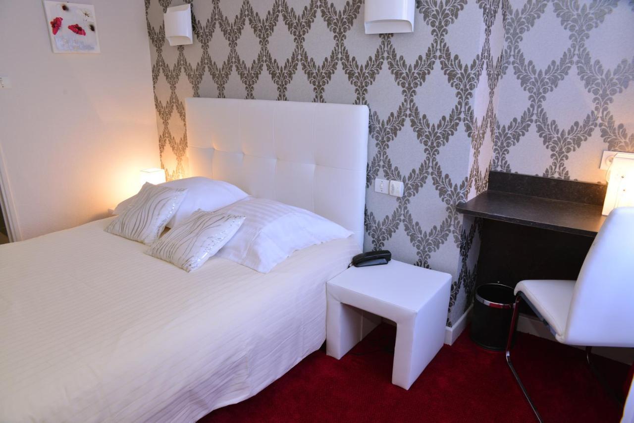 Hotel Le Square Aurillac Bagian luar foto